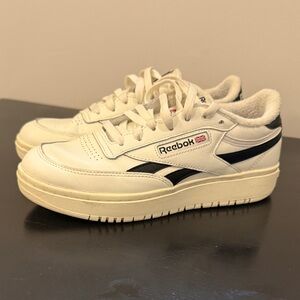 Reebok White Leather Sneakers with Black Stripes
